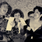 Singing to Maureen. (Left to right) Tracy Benton, Jeanne Gomoll, Kathi Nash, Elk Krisor, Ellen Franklin, ?, Barb Gilligan