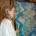 Darlene Coltrain with the silk panel she created for the art prize